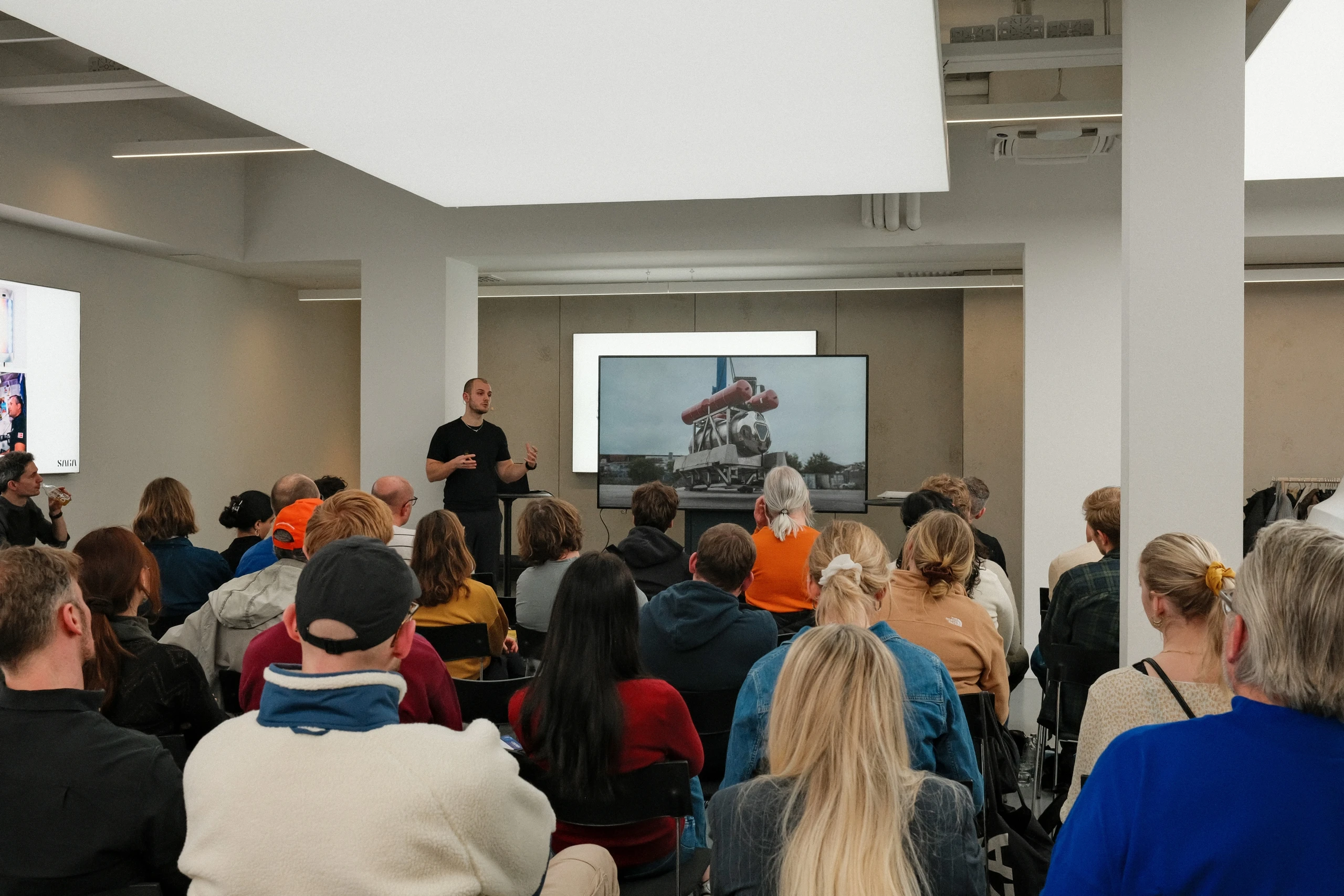 SAGA co-founder, Sebastian, giving a talk at Polestar's showroom in Copenhagen